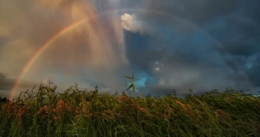 Rainbow against stormy skies